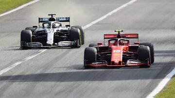 Formula One F1 - Italian Grand Prix - Circuit of Monza, Monza, Italy - September 8, 2019 Ferrari's Charles Leclerc and Mercedes' Lewis Hamilton in action during the race REUTERS/Massimo Pinca