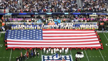 US country singer Mickey Guyton sings the National Anthem ahead of Super Bowl LVI between the Los Angeles Rams and the Cincinnati Bengals at SoFi Stadium in Inglewood, California, on February 13, 2022. (Photo by VALERIE MACON / AFP) (Photo by VALERIE MACON/AFP via Getty Images)