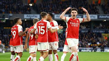 Soccer Football - Premier League - Wolverhampton Wanderers v Arsenal - Molineux Stadium, Wolverhampton, Britain - April 20, 2024  Arsenal's Declan Rice celebrates their first goal scored by Leandro Trossard REUTERS/Molly Darlington NO USE WITH UNAUTHORIZED AUDIO, VIDEO, DATA, FIXTURE LISTS, CLUB/LEAGUE LOGOS OR 'LIVE' SERVICES. ONLINE IN-MATCH USE LIMITED TO 45 IMAGES, NO VIDEO EMULATION. NO USE IN BETTING, GAMES OR SINGLE CLUB/LEAGUE/PLAYER PUBLICATIONS.