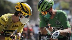 Cycling - Tour de France - Stage 10 - Ile d'Oleron to Ile de Re - France - September 8, 2020. Team Jumbo-Visma rider Primoz Roglic of Slovenia, wearing the overall leader's yellow jersey, and BORA-Hansgrohe rider Peter Sagan of Slovakia, wearing the green