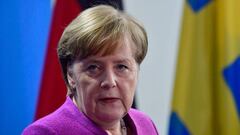 German Chancellor Angela Merkel gives a joint press conference with Sweden&#039;s Prime Minister on March 16, 2018 at the Chancellery in Berlin. / AFP PHOTO / John MACDOUGALL