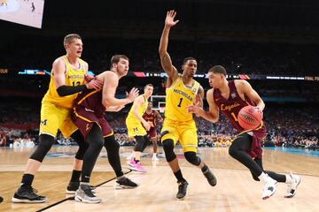 Las imágenes del triunfo de los Wolverines en el Final Four