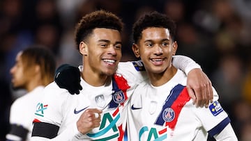 Soccer Football - Coupe de France - Quarter Final - Stade Briochin v Paris St Germain - Roazhon Park, Rennes, France - February 26, 2025 Paris St Germain's Senny Mayulu celebrates with Desire Doue after scoring their sixth goal REUTERS/Stephane Mahe