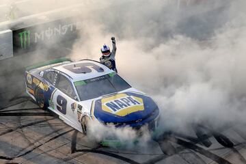Chase Elliott, driver of Chevrolet No. 9 celebrates his win at the Gander Outdoors 400 of the NASCAR Cup of Monster Energy at the Dover International Speedway in October 2018.