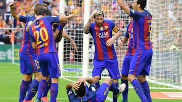 Barcelona players react to a bottle being thrown at Neymar at Mestalla