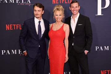 Actor Pamela Anderson, her son and Producer Brandon Thomas Lee and Director Ryan White attend a premiere for the documentary "Pamela: A Love Story" in Los Angeles, California, U.S., January 30, 2023. REUTERS/Mario Anzuoni