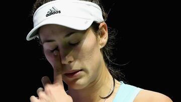 SINGAPORE - OCTOBER 26: Garbine Muguruza of Spain reacts in her singles match against Agnieszka Radwanska of Poland during day 4 of the BNP Paribas WTA Finals Singapore at Singapore Sports Hub on October 26, 2016 in Singapore. (Photo by Matthew Stockman/Getty Images for WTA)