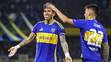 Boca Juniors' Chilean midfielder #08 Carlos Palacios celebrates with Boca Juniors' midfielder #22 Kevin Zenon after scoring during the Argentine Professional Football League 2025 Apertura Tournament match between Boca Juniors and Estudiantes de La Plata at La Bombonera stadium in Buenos Aires on April 19, 2025. (Photo by ALEJANDRO PAGNI / AFP)