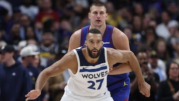 DENVER, COLORADO - MAY 04: Nikola Jokic #15 of the Denver Nuggets guards Rudy Gobert #27 of the Minnesota Timberwolves in the first quarter during Game One of the Western Conference Second Round Playoffs at Ball Arena on May 04, 2024 in Denver, Colorado. NOTE TO USER: User expressly acknowledges and agrees that, by downloading and or using this photograph, User is consenting to the terms and conditions of the Getty Images License Agreement.   Matthew Stockman/Getty Images/AFP (Photo by MATTHEW STOCKMAN / GETTY IMAGES NORTH AMERICA / Getty Images via AFP)