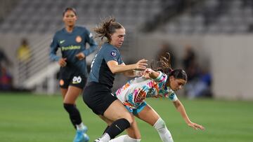 Sep 18, 2024; San Diego, CA, USA; Portland Thorns FC midfielder Sam Coffey (17) fouls San Diego Wave FC forward Melanie Barcenas (25) during the second half at Snapdragon Stadium. Mandatory Credit: Abe Arredondo-Imagn Images