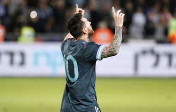 Messi celebrates after scoring in Argentina's 2-2 friendly draw with Uruguay on Monday.