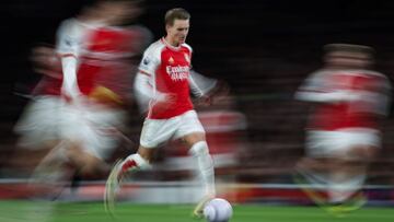 Arsenal's Norwegian midfielder #08 Martin Odegaard controls the ball during the English Premier League football match between Arsenal and Luton Town at the Emirates Stadium in London on April 3, 2024. (Photo by Adrian DENNIS / AFP) / RESTRICTED TO EDITORIAL USE. No use with unauthorized audio, video, data, fixture lists, club/league logos or 'live' services. Online in-match use limited to 120 images. An additional 40 images may be used in extra time. No video emulation. Social media in-match use limited to 120 images. An additional 40 images may be used in extra time. No use in betting publications, games or single club/league/player publications. / 