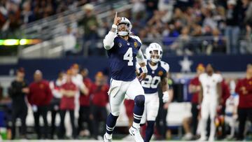 Nov 23, 2023; Arlington, Texas, USA; Dallas Cowboys quarterback Dak Prescott (4) celebrates throwing a touchdown in the fourth quarter against the Washington Commanders at AT&T Stadium. Mandatory Credit: Tim Heitman-USA TODAY Sports