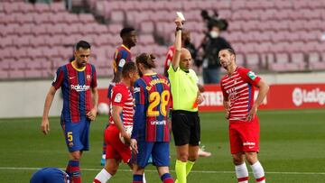Soccer Football - La Liga Santander - FC Barcelona v Granada - Camp Nou, Barcelona, Spain - April 29, 2021 Granada's Roberto Soldado is shown a yellow card by referee Pablo Gonzalez Fuetes REUTERS/Albert Gea