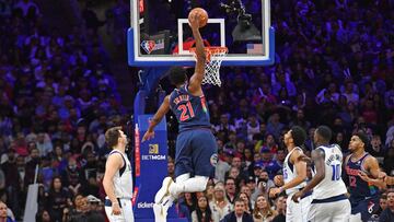 Mar 18, 2022; Philadelphia, Pennsylvania, USA; Philadelphia 76ers center Joel Embiid (21) slam dunks against the Dallas Mavericks during the second quarter at Wells Fargo Center. Mandatory Credit: Eric Hartline-USA TODAY Sports