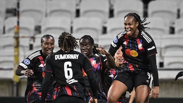 OL-Lyonnes' players celebrate a goal during the UEFA Women's Champions League quarter final second leg football match between OL Lyonnes (Lyon) and VfL Wolfsburg at the Groupama stadium in Decines-Charpieu, central-eastern France, on April 2, 2026. (Photo by JEFF PACHOUD / AFP)
