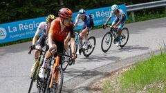 Team Ineos' Spanish rider Carlos Rodriguez cycles in the final ascent of Plateau des Gleires during the eighth and last stage of the 76th edition of the Criterium du Dauphine cycling race, 160,6km between Thones and Plateau des Glieres, near Thorens-Glieres, French Alps, on June 9, 2024. (Photo by Thomas SAMSON / AFP)