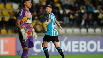 Racing's forward Adrian Martinez celebrates after scoring during the Copa Sudamericana group stage first leg football match between Chile's Coquimbo Unido and Argentina's Racing Club at the Municipal Francisco Sanchez Rumoroso Stadium in Coquimbo, Chile, on April 24, 2024. (Photo by Javier TORRES / AFP)