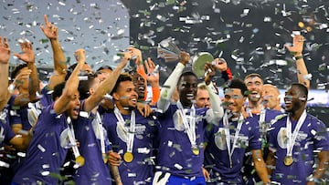 Mar 24, 2024; Arlington, Texas, USA; The United States team celebrates with the tropy after they defeat Mexico in the Concacaf Nations League Final at AT&T Stadium. Mandatory Credit: Jerome Miron-USA TODAY Sports