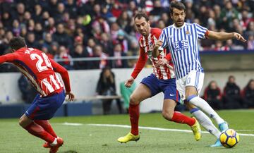 Xabi Prieto con Godín. 