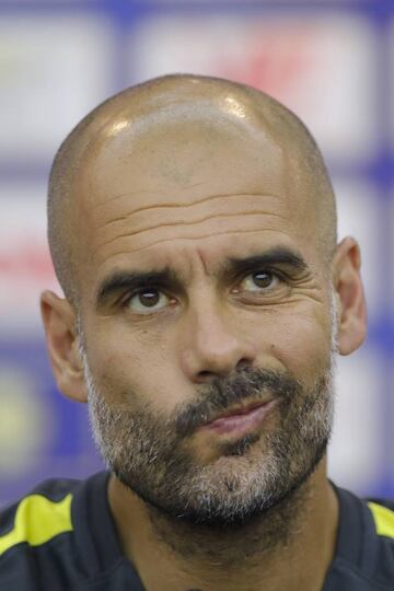 Manchester City's manager Pep Guardiola attends a press conference