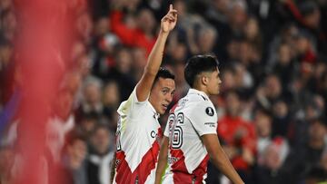 River Plate's midfielder Esequiel Barco (L) celebrates after scoring a goal during the Copa Libertadores group stage first leg football match between River Plate and Sporting Cristal at the Monumental stadium in Buenos Aires on April 19, 2023. (Photo by Luis ROBAYO / AFP)