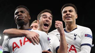 LONDON, ENGLAND - NOVEMBER 26: Serge Aurier of Tottenham Hotspur celebrates scoring their 3rd goal with Harry Winks and Dele Alli during the UEFA Champions League group B match between Tottenham Hotspur and Olympiacos FC at Tottenham Hotspur Stadium on No