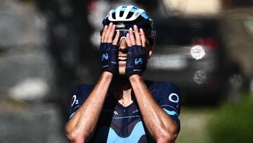 Movistar team's Spanish rider Carlos Verona celebrates as he crosses the finish line at the end of the seventh stage of the 74th edition of the Criterium du Dauphine cycling race, 135kms between Saint-Chaffrey to Vaujany, south-eastern France, on June 11, 2022. (Photo by Marco BERTORELLO / AFP)