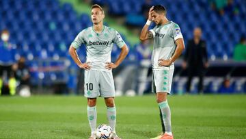 Sergio Canales of Real Betis and Marc Bartra of Real Betis laments during the spanish league, La Liga Santander, football match played between Getafe CF and Real Betis Balompie at Coliseum Alfonso Perez stadium on september 29, 2020 in Getafe, Madrid, Spa