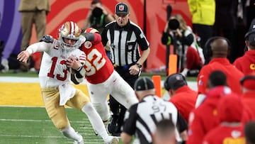 LAS VEGAS, NEVADA - FEBRUARY 11: Brock Purdy #13 of the San Francisco 49ers is tackled by Nick Bolton #32 of the Kansas City Chiefs in the first half during Super Bowl LVIII at Allegiant Stadium on February 11, 2024 in Las Vegas, Nevada.