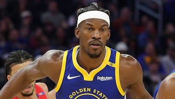 Jimmy Butler III makes his mark as Warriors outlast Blazers in a high-octane shootout in San Francisco.