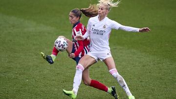 MADRID, SPAIN - DECEMBER 19: Sofia Jakobsson of Real Madrid women battle for the ball with Laia Aleixandri of Atletico de Madrid women during the Primera Division Femenina match between Real Madrid women and Altetico de Madrid Women at Estadio Alfredo Di