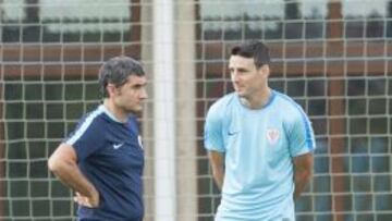 Valverde, con Aduriz.