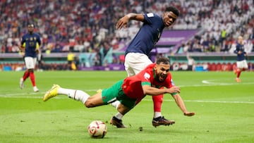 AL KHOR, QATAR - DECEMBER 14: Sofiane Boufal of Morocco and Aurelien Tchouameni of France battle for the ball during the FIFA World Cup Qatar 2022 semi final match between France and Morocco at Al Bayt Stadium on December 14, 2022 in Al Khor, Qatar. (Photo by Tnani Badreddine/DeFodi Images via Getty Images)