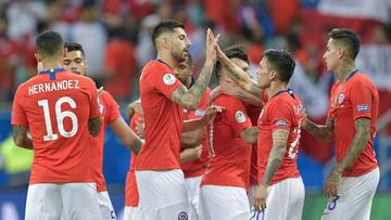 Players of Chile greet each other after defeating Ecuador 2-1 in a Copa America football tournament group match at the Fonte Nova Arena in Salvador, Brazil, on June 21, 2019. - Chile won 2-1. (Photo by Raul ARBOLEDA / AFP)