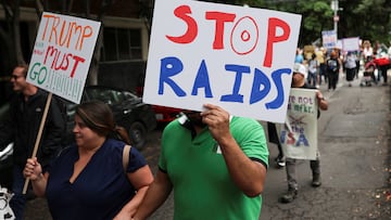 Demonstrators hold placards during the No Kings Day protest against U.S. President Donald Trump's policies, in Mexico City, Mexico, June 14, 2025. REUTERS/Luis Cortes