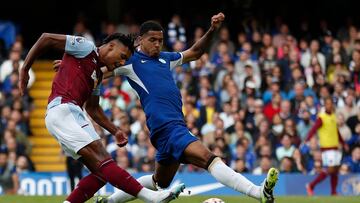 Aston Villa's English striker #11 Ollie Watkins (L) has this shot blocked by Chelsea's English defender #26 Levi Colwill (R) in the build-up to his goal during the English Premier League football match between Chelsea and Aston Villa at Stamford Bridge in London on September 24, 2023. Villa won the game 1-0. (Photo by Ian Kington / AFP) / RESTRICTED TO EDITORIAL USE. No use with unauthorized audio, video, data, fixture lists, club/league logos or 'live' services. Online in-match use limited to 120 images. An additional 40 images may be used in extra time. No video emulation. Social media in-match use limited to 120 images. An additional 40 images may be used in extra time. No use in betting publications, games or single club/league/player publications. /
