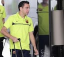 Xavi y Piqué hacen horas extras para llegar a Sevilla