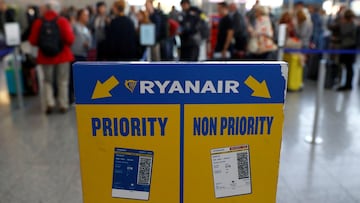FILE PHOTO: Stranded passengers of low-cost air carrier Ryanair queue for hotel vouchers or new tickets during European wide protests and strikes for Ryanair employees in demand for better working conditions at Fraport airport in Frankfurt, Germany, September 28, 2018. REUTERS/Kai Pfaffenbach/File Photo