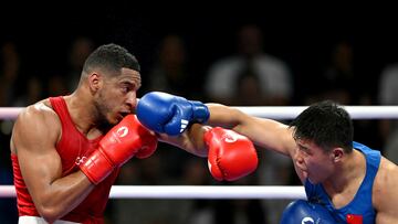 Enmanuel Reyes Pla en su combate con Han Xuezhen en octavos de final de los Juegos Olímpicos de París 2024.