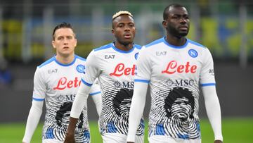 Napoli players paying homage to Diego Maradona during a Serie A game.