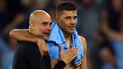 Soccer Football - Champions League - Semi Final - Second Leg - Manchester City v Real Madrid - Etihad Stadium, Manchester, Britain - May 17, 2023 Manchester City manager Pep Guardiola celebrates with Rodri after the match REUTERS/Molly Darlington