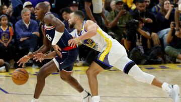 Kris Dunn y Stephen Curry -