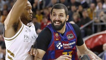 GRAF5180. BARCELONA, 29/12/2019.- El ala-pívot del Barça, Nikola Mirotic (d), intenta avanzar con la pelota ante la oposición de Anthony Randolph (i), del Real Madrid, durante el partido de la Liga ACB jugado esta tarde en el Palau Blaugrana de Barcelona. EFE/Andreu Dalmau