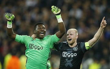 Davy Klaassen and keeper Andre Onana celebrate their win over Lyon in the Europa League