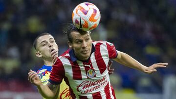   Alvaro Fidalgo (L) of America fights for the ball with Fernando Gonzalez (R) of Guadalajara  during the round of 16 second leg match between America and Guadalajara - Round of 16as part of the CONCACAF Champions Cup 2024, at Azteca Stadium on March 13, 2024 in Mexico City, Mexico.