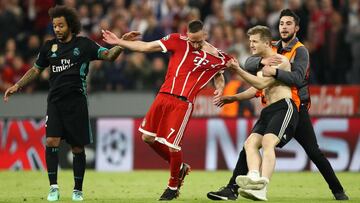 UEFA charges Bayern Munich over pitch invasion and banner