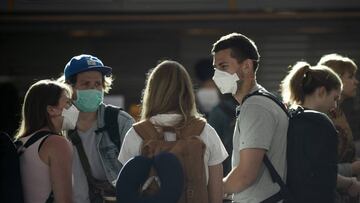 Passengers stand in line to check-in for a Lufthansa flight to Frankfurt at Ezeiza International Airport in Buenos Aires, Argentina, on Monday, March 23, 2020. The German Foreign Ministry organized a flight to evacuate hundreds of travelers stranded in Argentina, as part of a worldwide effort to get people home during the new coronavirus outbreak. A few other European Union citizens were on the flight as well. (AP Photo/Victor R. Caivano)