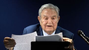 Hungarian-born US investor and philanthropist George Soros addresses the assembly on the sidelines of the World Economic Forum (WEF) annual meeting in Davos on May 24, 2022. (Photo by Fabrice COFFRINI / AFP)