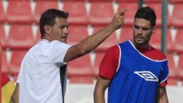 M¨ªchel junto a Bot¨ªa.